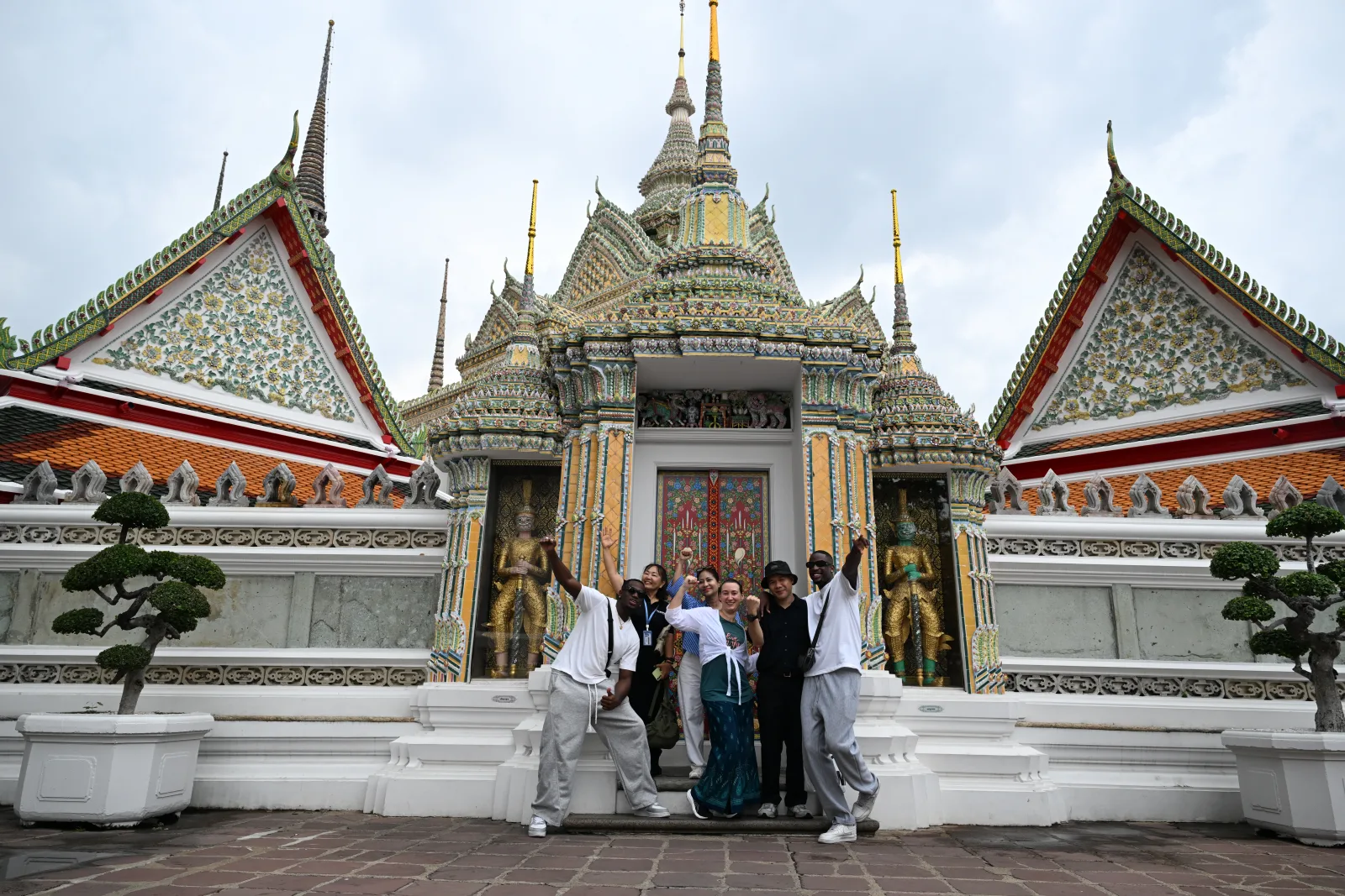 Folkpaths guests enjoying their visit together at Wat Pho in Bangkok